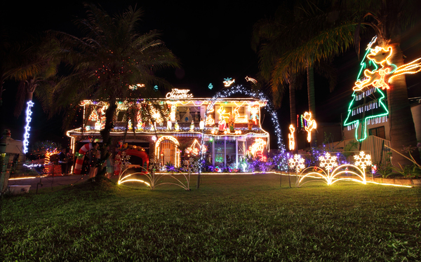 House decorated with a variety of Christmas lights and decorations for the festive season of Christmas in Australia. 