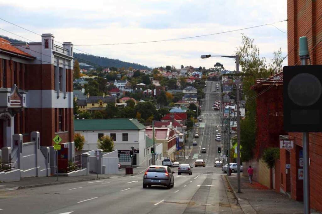 View of a street in Hobart, Tasmania, showcasing the city's tranquil environment and local architecture, reflecting the pros and cons of living in Tasmania.