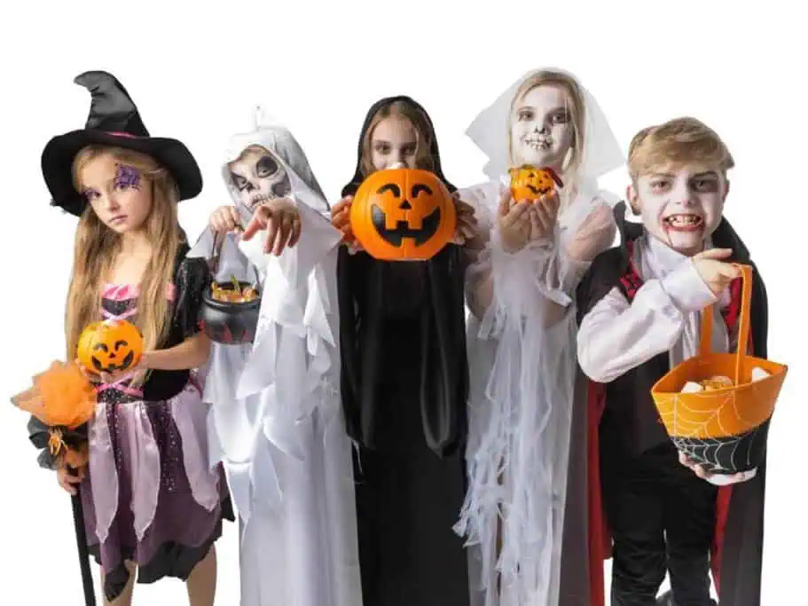 A group of children dressed in Halloween costumes, holding pumpkin buckets while trick-or-treating. This image captures the festive spirit of Halloween in Sydney, where kids can enjoy activities like trick-or-treating and fun-filled Halloween events.