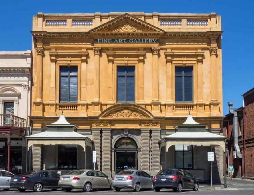 Historic facade of the Art Gallery of Ballarat on a sunny day, showcasing the city's rich heritage and cultural scene—an important aspect when weighing the pros and cons of living in Ballarat.