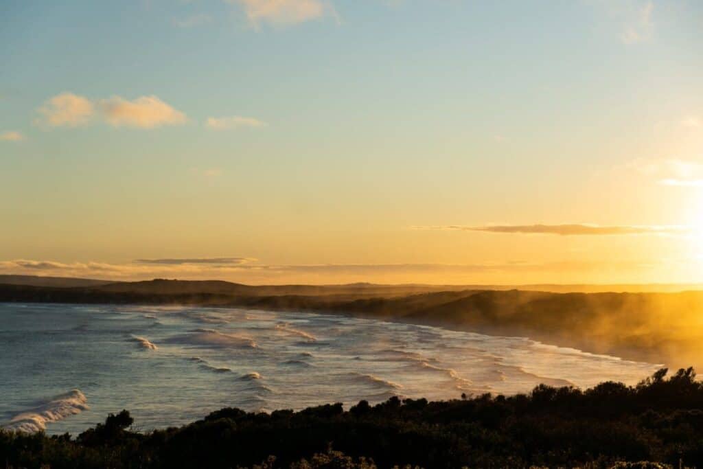 Sunset view over the ocean at Bremer Bay in Western Australia. This serene coastal scene is included in a blog post about Australia travel deals, emphasising picturesque locations to explore.
