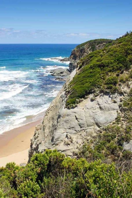Cliffside view of the ocean at Cape Otway National Park in Victoria, Australia. This scenic coastal area is featured in a blog post about Australia travel deals, highlighting beautiful natural destinations.