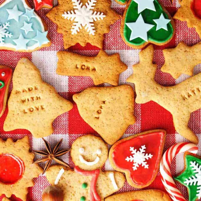 Festive gingerbread cookies in Christmas shapes, including trees, stars, and reindeer, showcasing the creativity and charm of Australia's Christmas desserts.