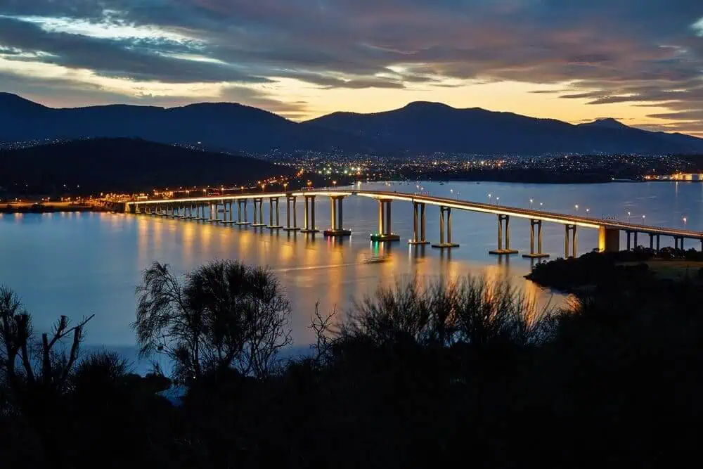 Twilight view of the Tasman Bridge in Hobart, with no snow in sight, raising the question: Does it snow in Hobart?