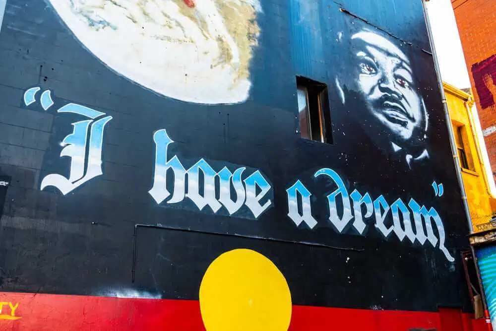 Graffiti of Martin Luther King Jr. with the phrase 'I have a dream' on a wall in Sydney, representing the cultural expression discovered on Food and Art Tours in Sydney."