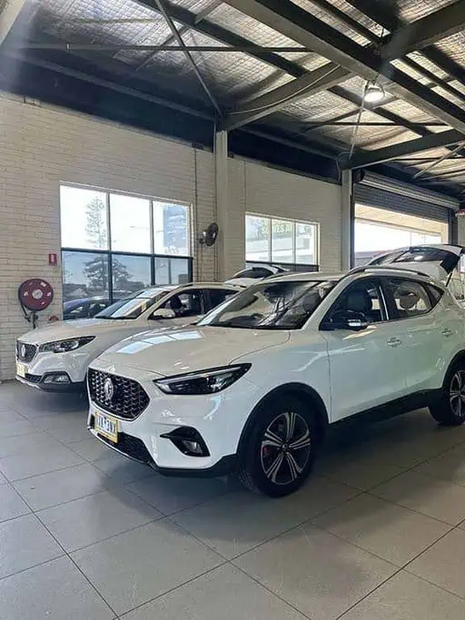 A lineup of various cars at the East Coast Car Rental depot, ready for customers renting vehicles on the Gold Coast