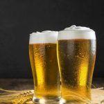 front view glasses of beer with wheat