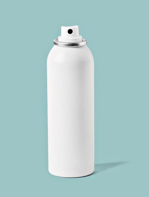 A white aerosol spray can against a light blue background. The image relates to packing restrictions for Australia, as aerosol sprays can be subject to airline safety regulations due to pressure changes during flights.