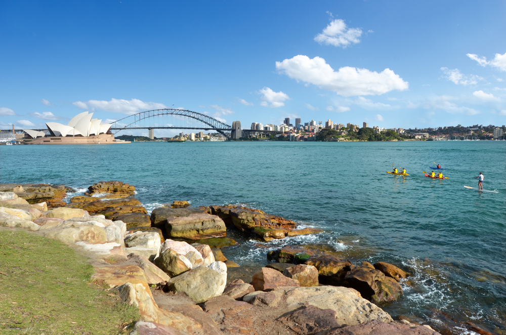 Sydney Harbour skyline with the Sydney Harbour Bridge and the Opera House in New South Wales, Australia.