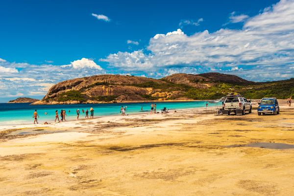 Holiday makers and tourists flock to the spectacular sandy beach and aqua waters at Hellfire Bay, in Western Australia.
