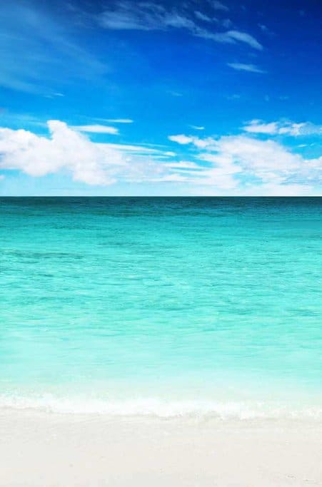 The tranquil waters and fine white sand of Hyams Beach under a clear blue sky, embodying the serene beauty of beaches in Australia.