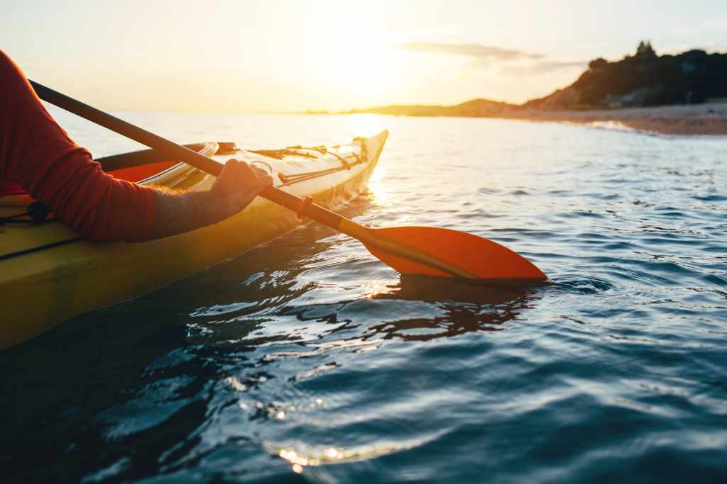 Kayaking and paddling in the water