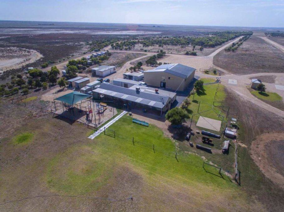 Aerial view of the skydiving facilities at Langhorne Creek, showcasing the extensive setup for adventure activities. This image highlights the comprehensive skydiving infrastructure available in Langhorne Creek, linking to Australia travel deals that make such thrilling experiences accessible.