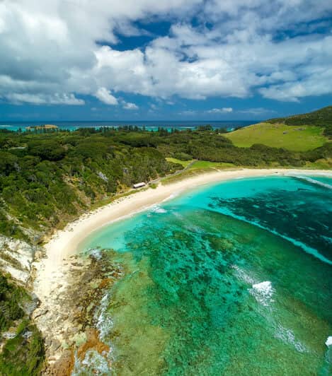 An aerial view of Lord Howe Island, showcasing its stunning natural beauty and serene environment, illustrating why Australia is an ideal honeymoon destination.