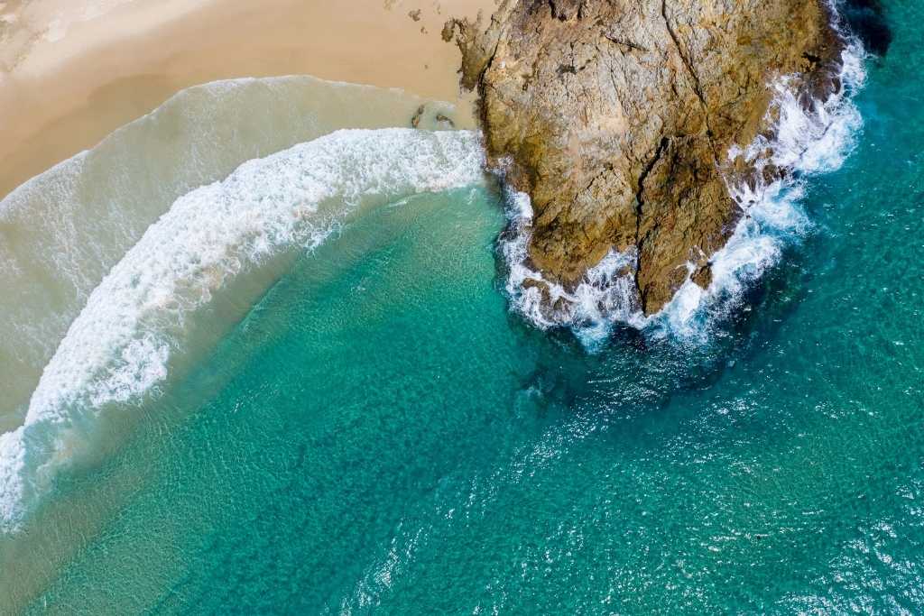 The coast of Moreton Island in one of the road trips from brisbane