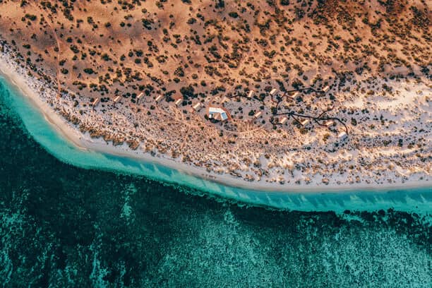 Aerial view of Sal Salis Ningaloo Reef, demonstrating the unique and romantic destinations available, answering the question: Is Australia a good place to spend a honeymoon?