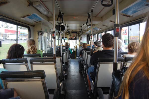 Interior of a Perth bus filled with passengers, demonstrating the city's public transport usage for the topic 'Does Australia Have Good Public Transport?'