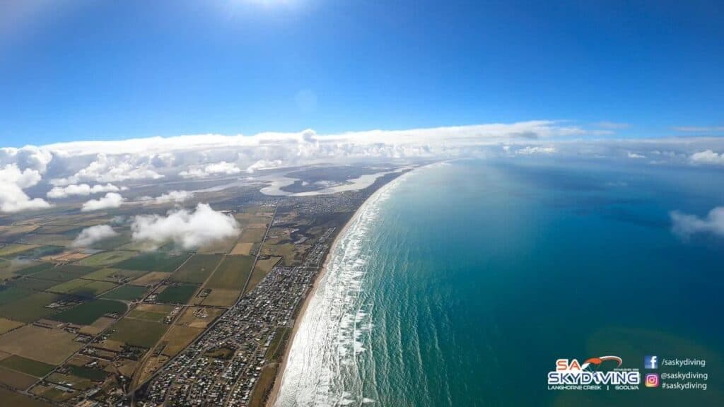 View of Goolwa coastline from above, showcasing the stunning coastal landscape ideal for skydiving adventures. This image highlights the beautiful scenery that participants experience when they skydive in Goolwa, adding to the overall appeal of the activity.