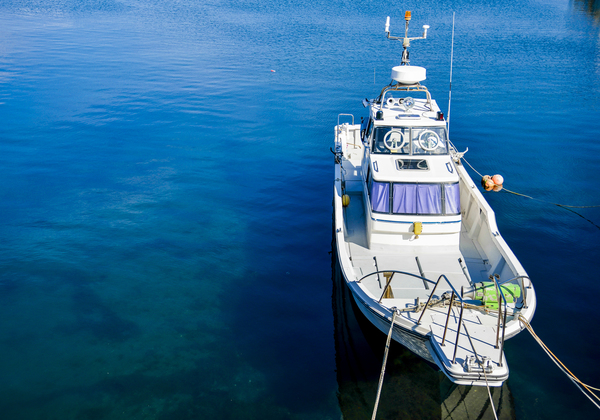 A view of a speed boat and the sea