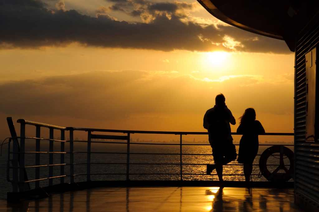 watching the sunset while on a cruise