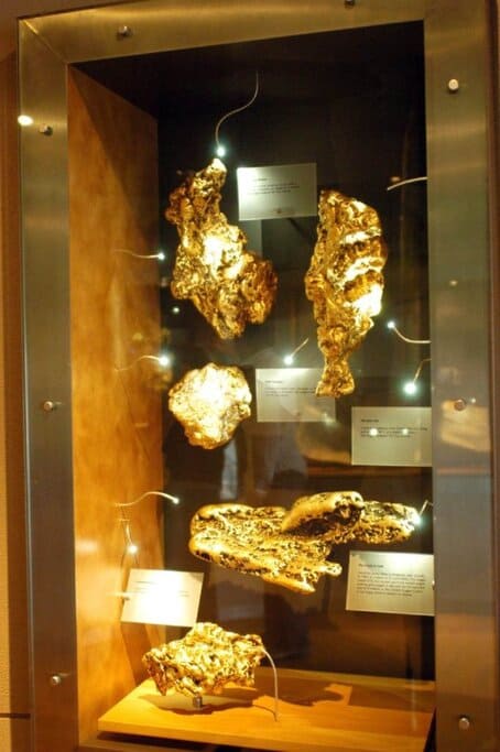 Large gold nuggets on display at a museum in Ballarat, showcasing the city’s gold rush legacy—part of what shapes the lifestyle and appeal of living in Ballarat.