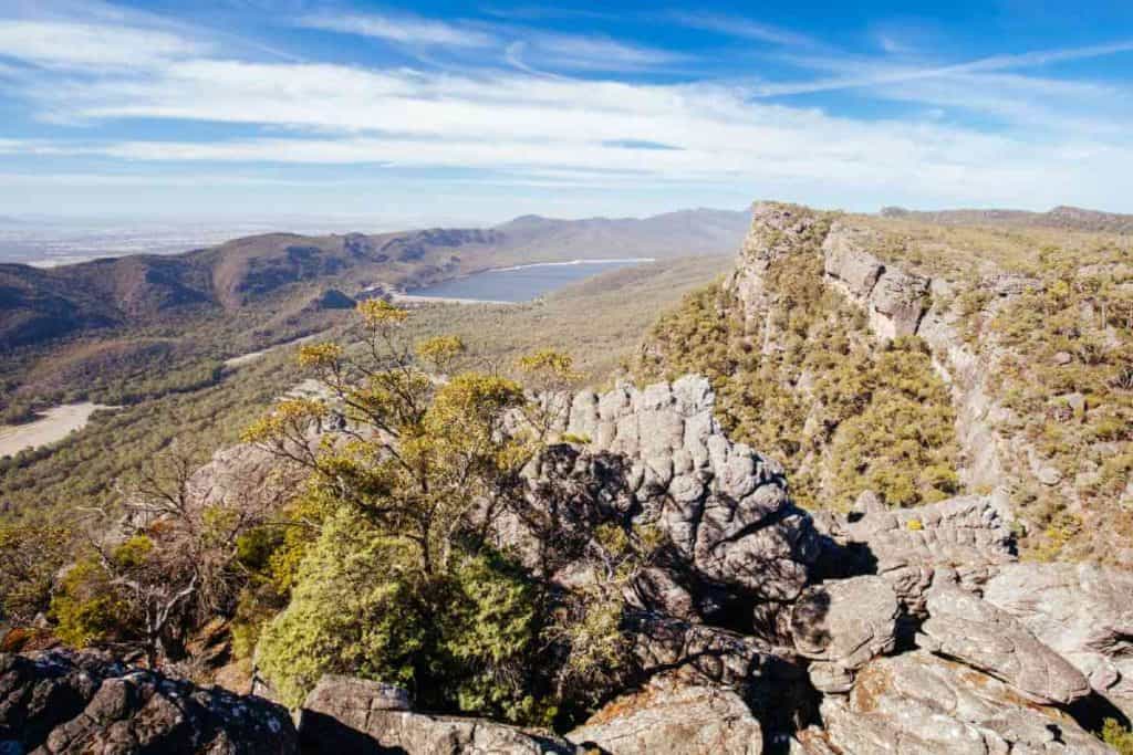A stunning view from the Wonderland Range in the Grampians National Park, showcasing rugged cliffs and expansive landscapes, a highlight of hiking trails in Victoria, Australia.
